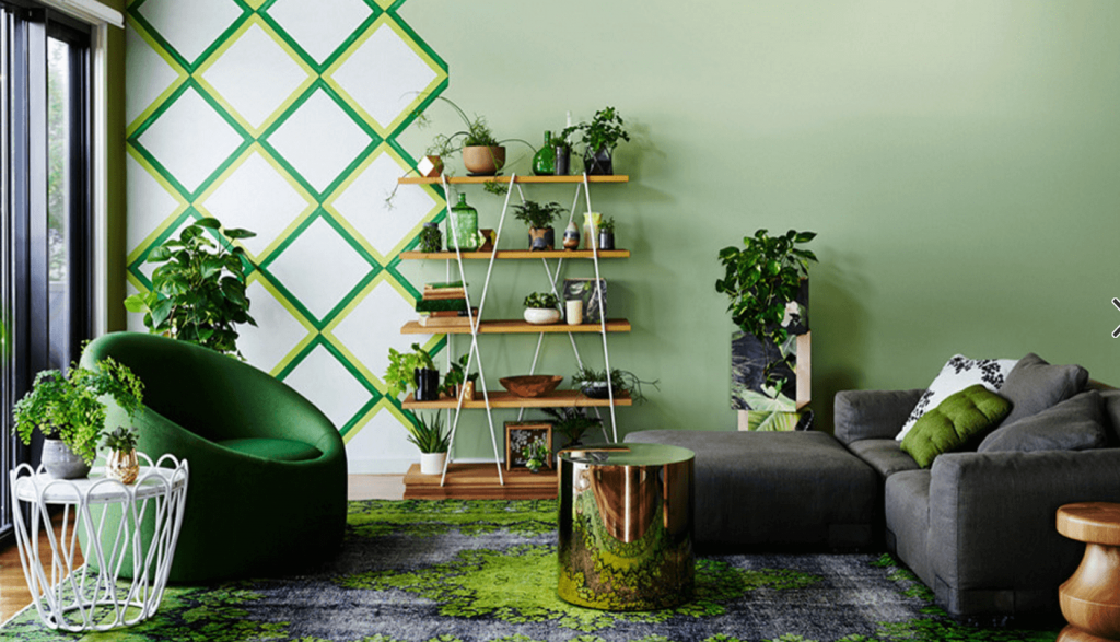 Houseplant decor ideas: A cozy corner with a variety of potted plants adding greenery to the room