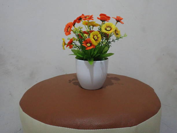 What to put in the bottom of a vase with fake flowers.